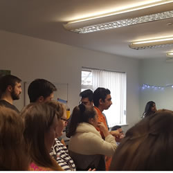 Students listening to the welcome discussion on the meaning of Diwali at the NTU Global Lounge.