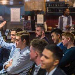 Me among a crowd of young students watching a presentation at the LGBT Leaders event