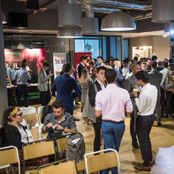 Students chatting and mingling at the afternoon jobfair at the LGBT Leaders event.